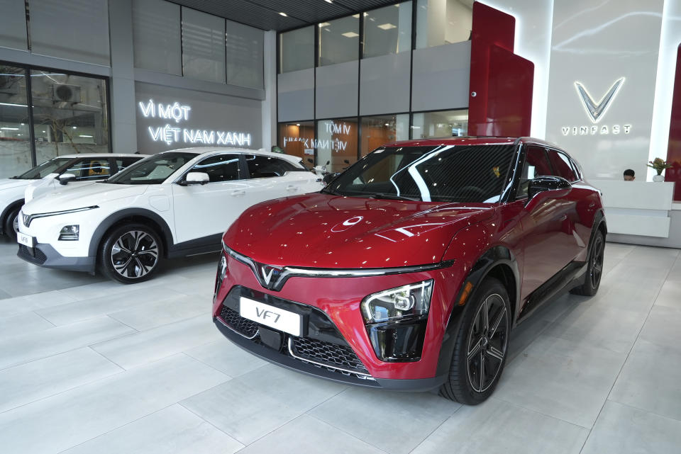 This photo shows Vinfast electric cars displayed in a showroom in Hanoi, Vietnam on June 10, 2024. Vietnamese automaker VinFast just can’t sell enough cars, so it's hoping its tiniest and cheapest car yet — a roughly 10-foot-long mini-SUV priced at $9,200 and called the VF3 — will become Vietnam's “national car" and win over consumers in Asian markets. (AP Photo/Hau Dinh)