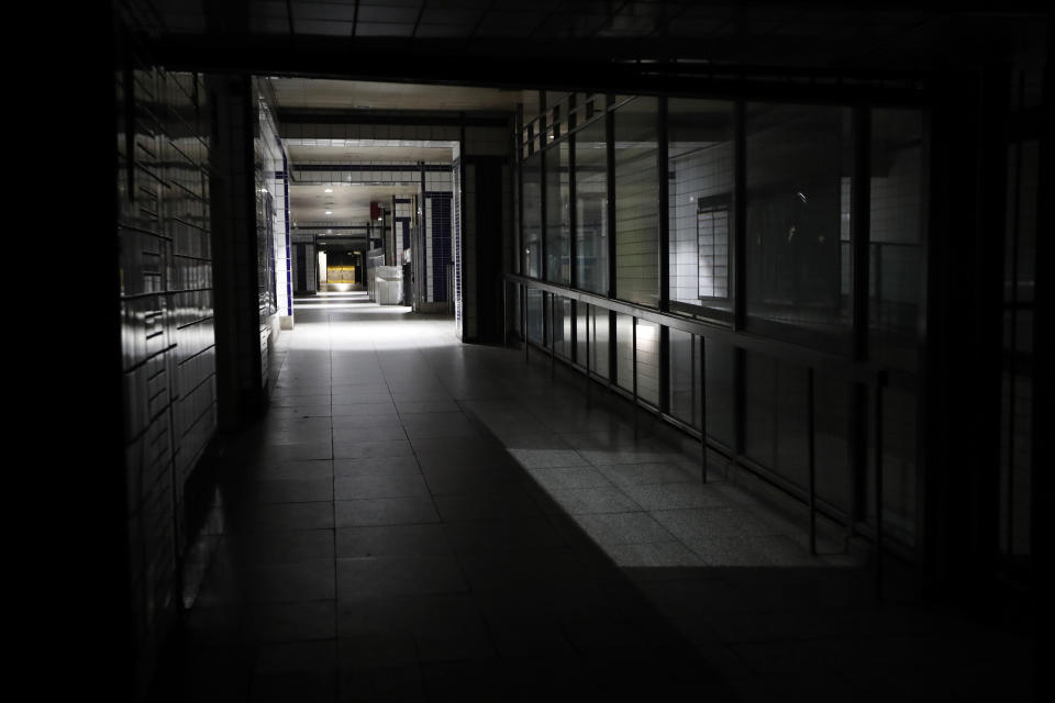 A subway station is in the dark during a widespread power outage, Saturday, July 13, 2019, in New York. Authorities were scrambling to restore electricity to Manhattan following a power outage that knocked out Times Square's towering electronic screens, darkened marquees in the theater district and left businesses without electricity, elevators stuck and subway cars stalled. (AP Photo/Michael Owens)