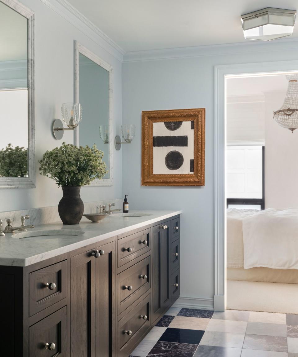 bathroom with chequered floor and twin basins