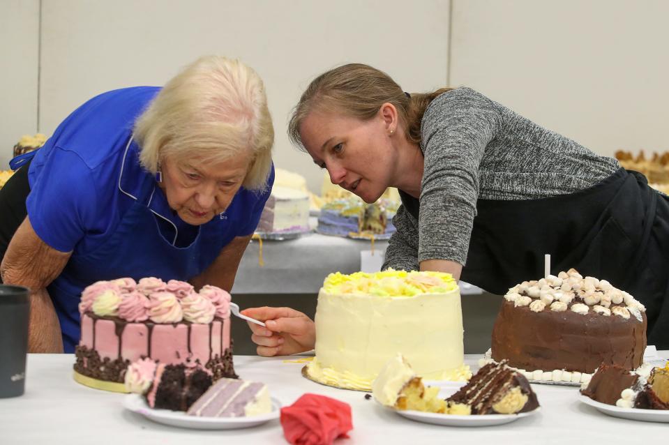 Janette Chapman and Elizabeth Coots judge the Your Favorite Cake competition at the Kentucky State Fair.