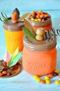 <p>Display these pumpkin Mason jars across your table or at each place setting, and encourage guests to take one with them after dinner. They're not complete without a candy filling!</p><p><strong>Get the tutorial at <a rel="nofollow noopener" href="http://www.the36thavenue.com/diy-pumpkin-mason-jars/" target="_blank" data-ylk="slk:The 36th Avenue;elm:context_link;itc:0;sec:content-canvas" class="link ">The 36th Avenue</a>. </strong></p>