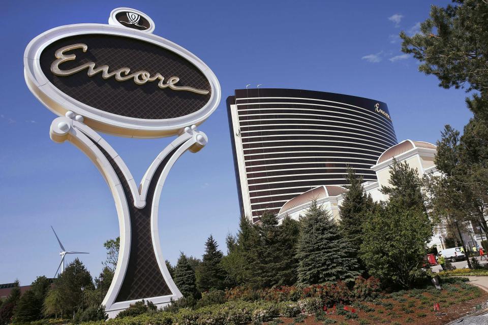 FILE - This May 22, 2019 file photo shows Encore Boston Harbor in Everett, Mass. The $2.6 billion Wynn resort casino is scheduled to open June 23 transforming a contaminated property into what is billed as a waterfront oasis. (AP Photo/Michael Dwyer, File)