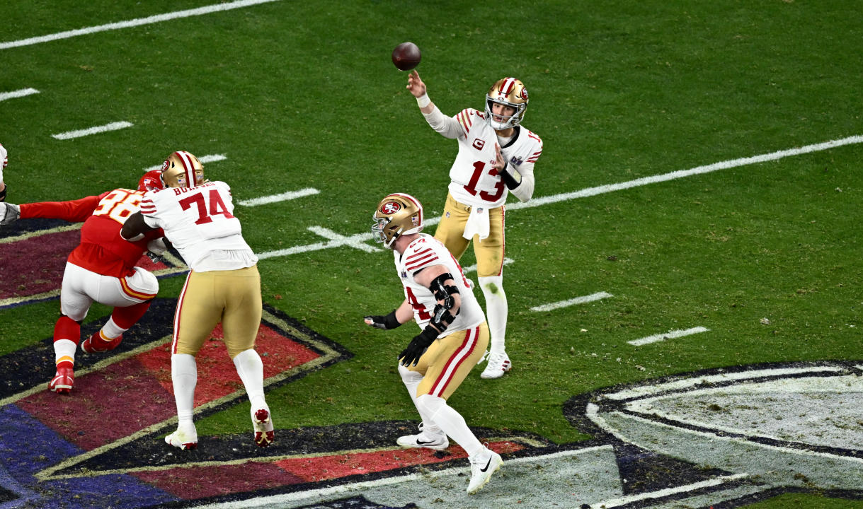 San Francisco 49ers' quarterback #13 Brock Purdy throws the ball during Super Bowl LVIII between the Kansas City Chiefs and the San Francisco 49ers at Allegiant Stadium in Las Vegas, Nevada, February 11, 2024. (Photo by Patrick T. Fallon / AFP) (Photo by PATRICK T. FALLON/AFP via Getty Images)