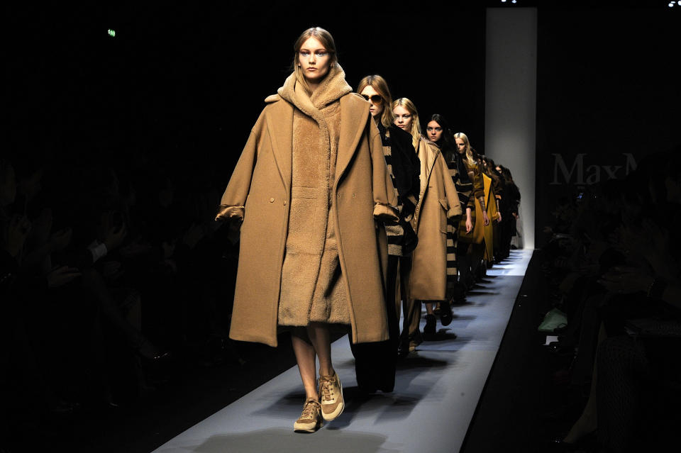 A model wears a creation for Max Mara women's Fall-Winter 2013-14 collection, part of the Milan Fashion Week, unveiled in Milan, Italy, Thursday, Feb. 21, 2013. (AP Photo/Giuseppe Aresu)