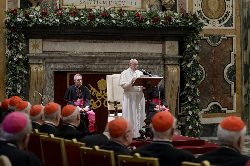 FILE - In this Dec. 21, 2019 file photo, Pope Francis delivers his speech on the occasion of his Christmas greetings to the Roman Curia, in the Clementine Hall at the Vatican. Pope Francis issued tough new anti-corruption regulations Thursday, April 29, 2021, to keep Vatican cardinals and managers honest, requiring them to periodically declare they aren't under criminal investigation or stashing money in tax havens, and are investing only in funds consistent with Catholic doctrine. (AP Photo/Andrew Medichini, Pool)