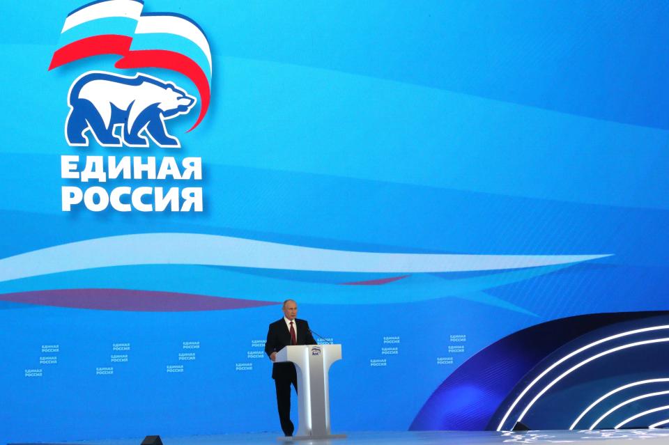 Russian President Vladimir Putin delivers his speech at the United Russia party congress in Moscow, Russia, Saturday, June 19, 2021. The sign of the United Russia party is in the background. (Sergei Karpukhin, Sputnik, Kremlin Pool Photo via AP)