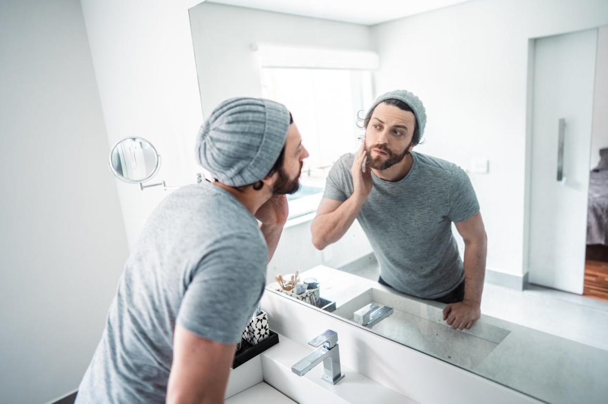 Algorithms could serve as mirrors for you to check your biases. <a href="https://www.gettyimages.com/detail/photo/mid-adult-man-checking-his-beard-in-the-bathrooms-royalty-free-image/1655179801" rel="nofollow noopener" target="_blank" data-ylk="slk:FG Trade/E+ via Getty Images;elm:context_link;itc:0;sec:content-canvas" class="link ">FG Trade/E+ via Getty Images</a>