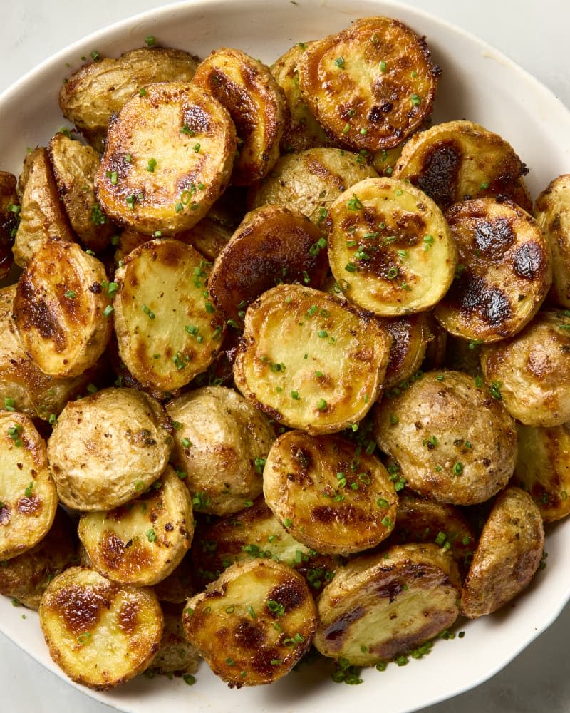 A serving bowl full of ranch roasted potatoes.