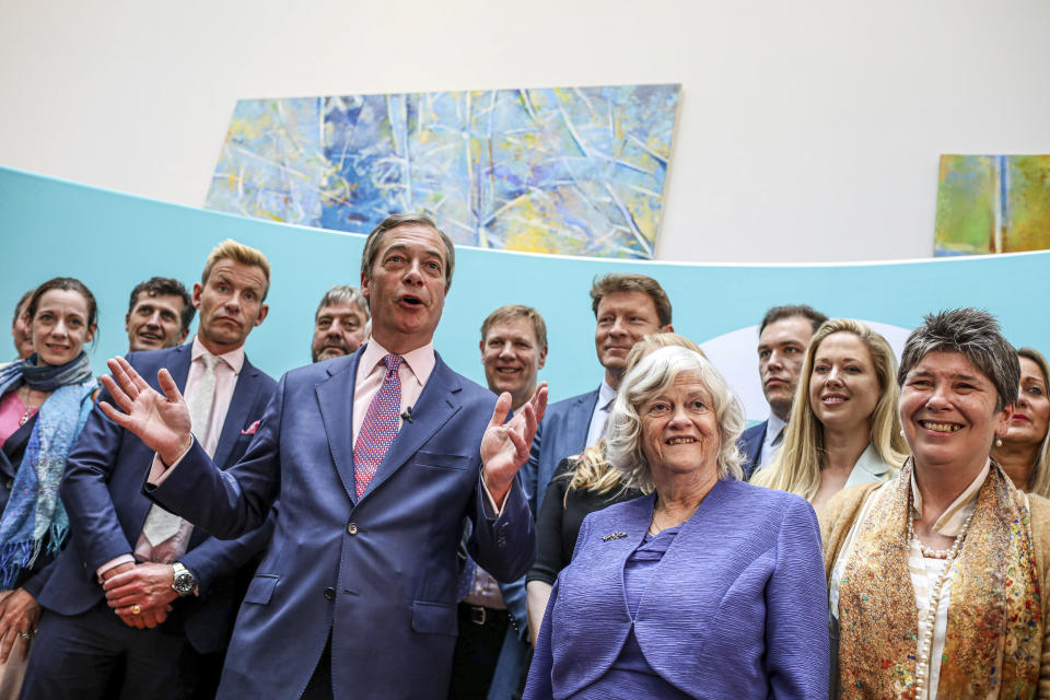 Brexit Party leader Nigel Farage, center left, speaks to the media at an event to mark the gains his party made in the European Elections, in London, Monday, May 27, 2019. In results announced Monday for all regions of the U.K. except Northern Ireland, the Brexit Party had won 29 of the 73 British EU seats up for grabs and almost a third of the votes. At second right is Brexit Party MEP and former Conservative lawmaker Anne Widdecombe. (AP Photo/Vudi Xhymshiti)