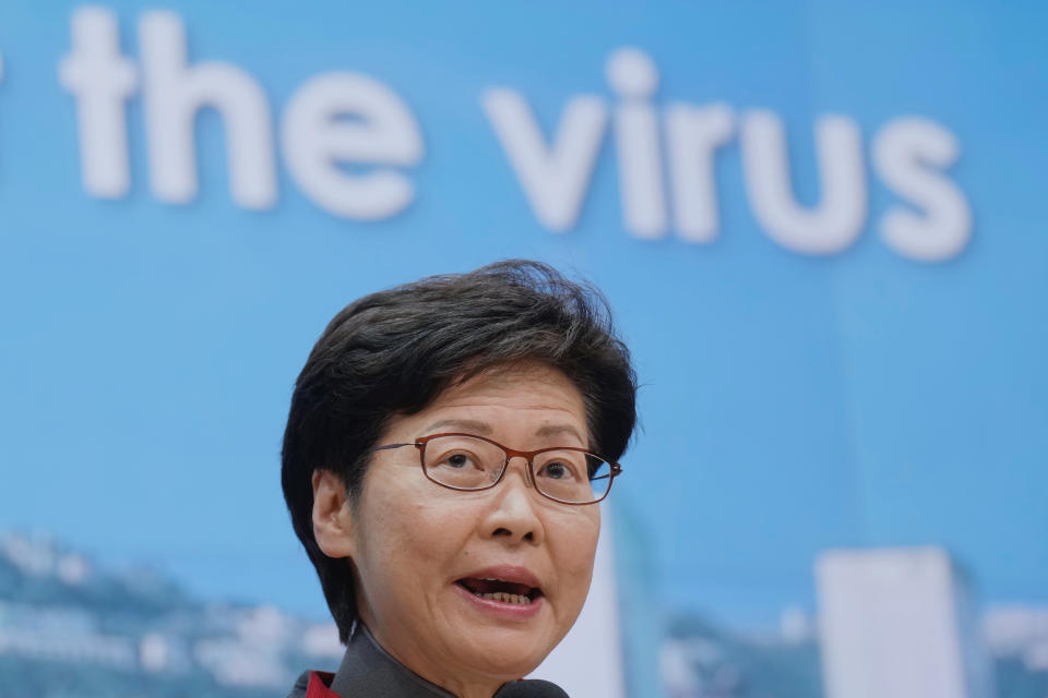 FILE - Hong Kong Chief Executive Carrie Lam speaks during a news conference in Hong Kong, Wednesday, Jan. 5, 2022. Lam announced Tuesday, Jan 25, 2022, that Hong Kong is expanded a partial lockdown and tightened pandemic restrictions after more than 200 cases of COVID-19 were discovered at a public housing estate. (AP Photo/Vincent Yu, File)
