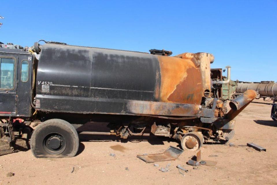 A photo from the Texas State Fire Marshal's Office report shows another Mensch manure vacuum truck parked on the east side of the barn. It caught fire three months before the giant April 2023 fire.