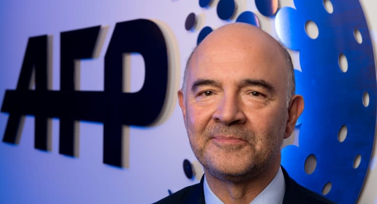 Pierre Moscovici, Commissioner for Economic and Finacial Affairs, Taxation and Customs of the European Commission poses for a photo while visiting the Agence France-Presse offices September 18