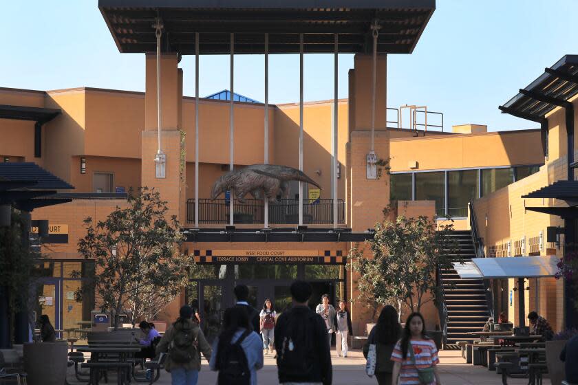 Irvine, CA - May 11: A view of students and faculty at the courtyard at the University of California-Irvine in Irvine Thursday, May 11, 2023. UC Irvine is boosting student housing construction amid a critical statewide shortage of affordable dorms, which has pushed some students to live in cars, tents or squeezed into cramped quarters with several roommates. UCI received a state housing construction grant, one of the few UC campuses to do so; the funds will help the university offer rents at 30% below market value. (Allen J. Schaben / Los Angeles Times)