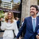 <p>The supermodel married philanthropist Arnault and shared a picture of herself and her new husband walking out of the registry office on Monday September 21.</p><p>The star wore an ivory-coloured collared Ulyana Sergeenko Couture dress with padded shoulders and a belted. The dress featured sweet hand-stitched embroidery in fuchsia and was teamed with ivory-hued court shoes.</p><p>'OUI,' she captioned the photograph and video of her leaving the registry office. </p><p><a href="https://www.instagram.com/p/CFZzsOND0mk/" rel="nofollow noopener" target="_blank" data-ylk="slk:See the original post on Instagram;elm:context_link;itc:0;sec:content-canvas" class="link ">See the original post on Instagram</a></p>