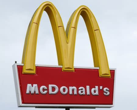 A McDonald's sign is shown outside one of their restaurants in Encinitas, California January 29, 2015. REUTERS/Mike Blake