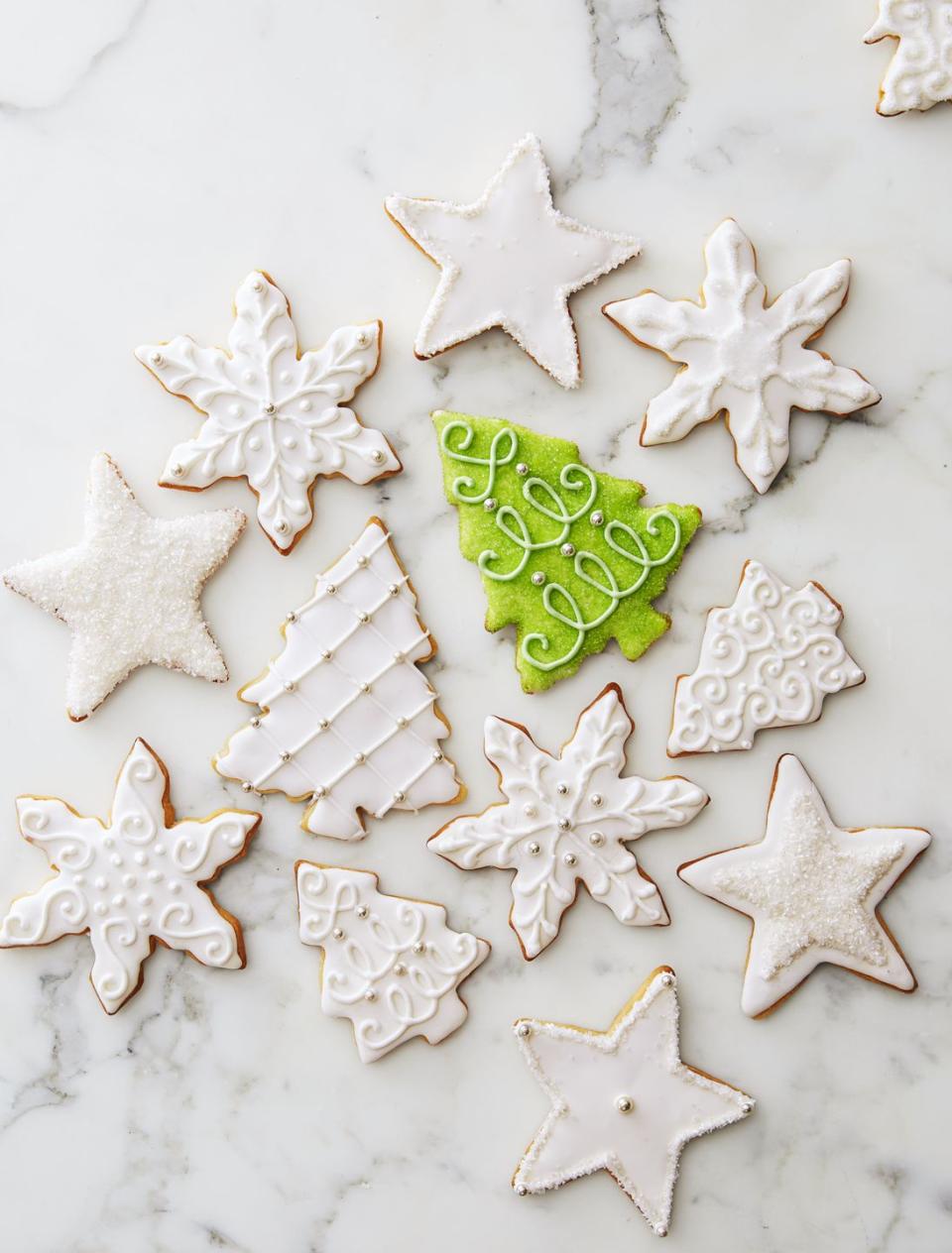 <p>How are we updating the classic cutout cookie? With subtle almond and vanilla flavors, plus a crazy-simple decorative glaze.</p><p>Get the<strong> <a href="https://www.goodhousekeeping.com/food-recipes/dessert/a35762/glazed-vanilla-almond-cutouts/" rel="nofollow noopener" target="_blank" data-ylk="slk:Glazed Vanilla-Almond Cutout Cookies recipe;elm:context_link;itc:0;sec:content-canvas" class="link ">Glazed Vanilla-Almond Cutout Cookies recipe</a></strong>.</p>