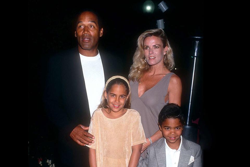 <p>Ron Davis/Getty</p> O.J. Simpson,  Nicole Brown Simpson with their two children, Sydney and Justin, in March 1994.