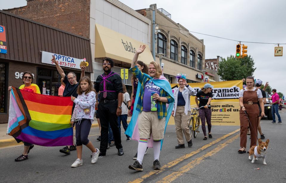 Members, friends, and supporters of the Hamtramck Queer Alliance march together during the Labor Day parade in Hamtramck on Monday, Sept. 5, 2022. 