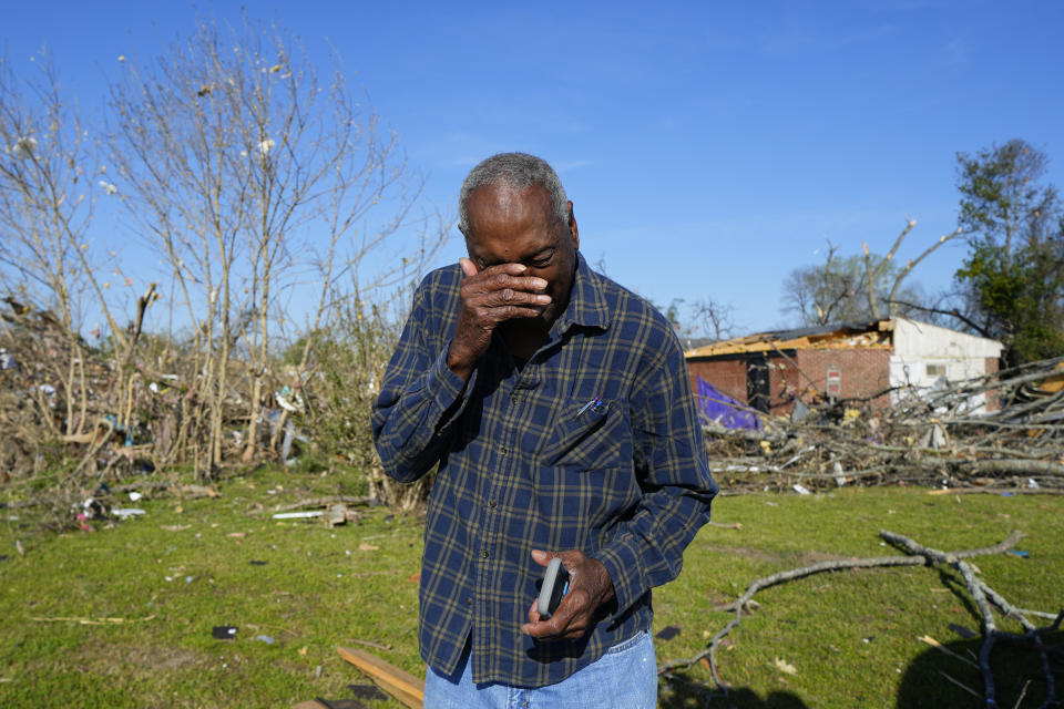 Ezell Williams cries while talking about the damage caused to his properties and those of his neighbors, Sunday, March 26, 2023, in Rolling Fork, Miss., where a tornado swept through the town two days earlier. Emergency officials in Mississippi say several people have been killed by tornadoes that tore through the state on Friday night, destroying buildings and knocking out power as severe weather produced hail the size of golf balls moved through several southern states. (AP Photo/Julio Cortez)