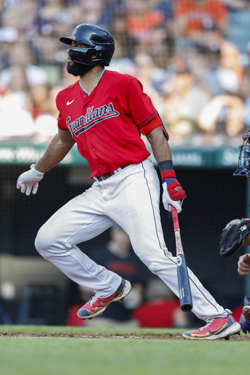 Cleveland Guardians' Amed Rosario watches his two-run single off Houston Astros starting pitcher Luis Garcia during the second inning of a baseball game, Saturday, Aug. 6, 2022, in Cleveland. (AP Photo/Ron Schwane)