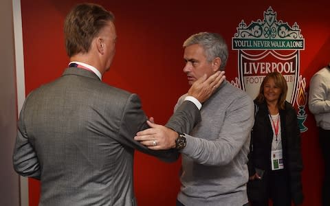 Louis van Gaal beats his successor to the cheek tap - Credit:  John Powell/Liverpool FC via Getty Images