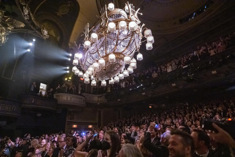 The chandelier is lowered during "The Phantom of the Opera" curtain call following the final Broadway performance at the Majestic Theatre on Sunday, April 16, 2023, in New York. (Photo by Charles Sykes/Invision/AP)