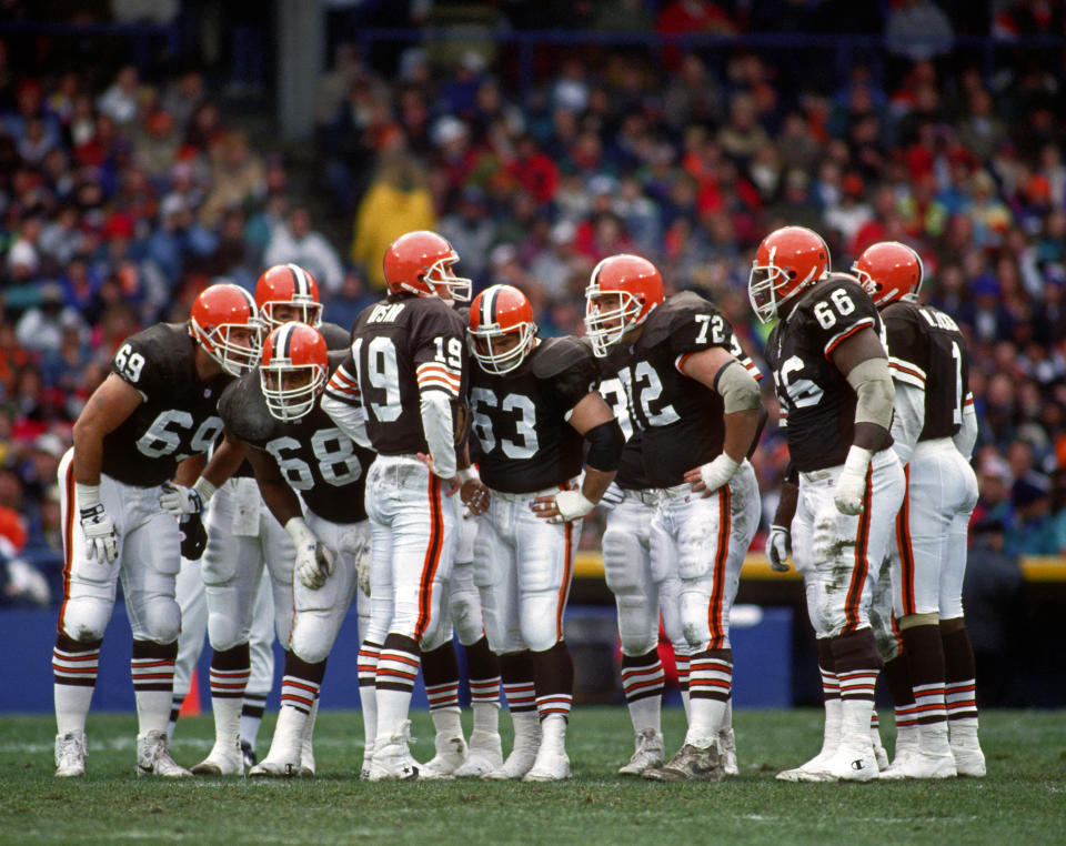 The Browns are going back to white facemasks, shown here in a 1992 game including quarterback Bernie Kosar (19). (Photo by George Gojkovich/Getty Images)