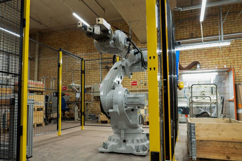 A newly-installed robot arm for marking shells at the Nammo ammunition plant in Karlskoga, Sweden on April 2, 2024. (Olena Zashko / The Kyiv Independent)