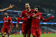 <p>Soccer Football – Champions League Quarter Final Second Leg – Manchester City vs Liverpool – Etihad Stadium, Manchester, Britain – April 10, 2018 Liverpool’s Mohamed Salah celebrates scoring their first goal with Virgil van Dijk REUTERS/Andrew Yates </p>