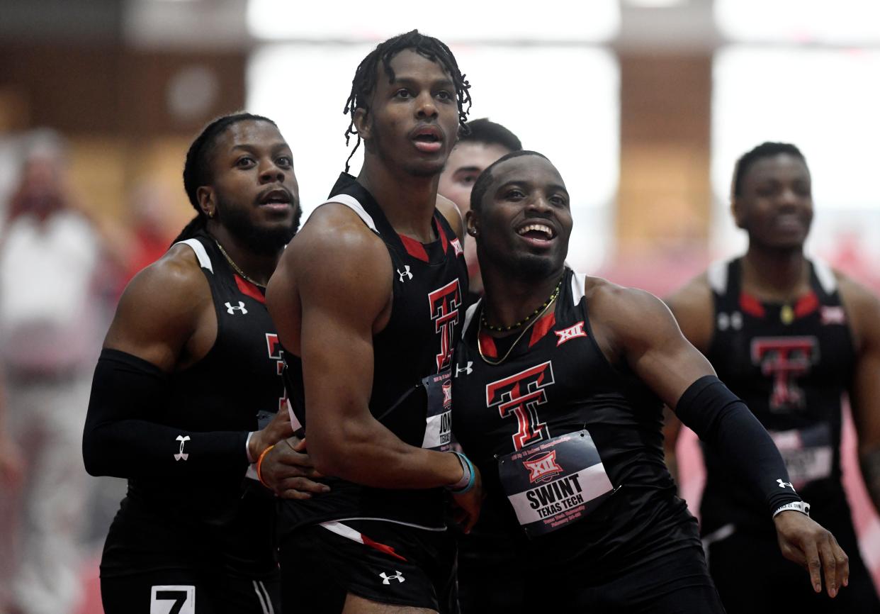 From left to right, Texas Tech's Nylo Clarke, Terrence Jones and Don'Dre Swint check the scoreboard after the 60 meters during Saturday's final day of the Big 12 indoor track and field championships at the Sports Performance Center. Jones finished first, Swint second and Clarke eighth in a race in which the Red Raiders had six of the top eight.