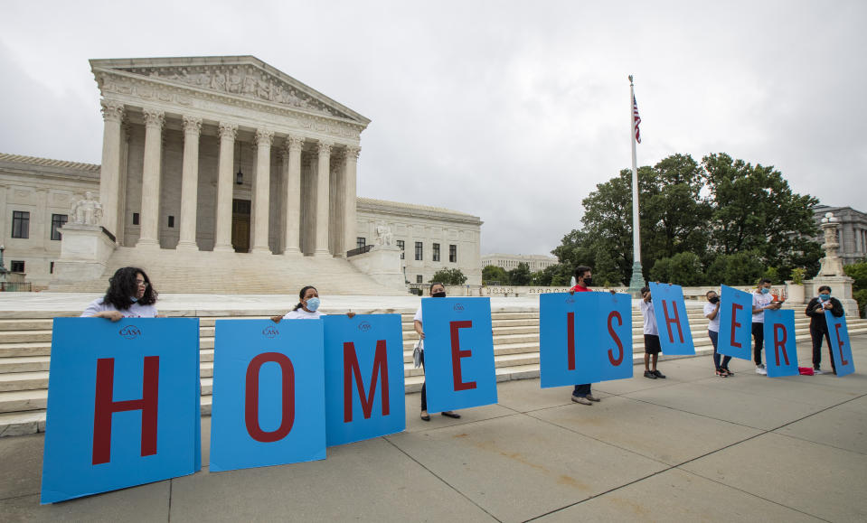 Deferred Action for Childhood Arrivals (DACA) students gather in front of the Supreme Court on Thursday, June 18, 2020, in Washington. The Supreme Court on Thursday rejected President Donald Trump’s effort to end legal protections for 650,000 young immigrants, a stunning rebuke to the president in the midst of his reelection campaign. (AP Photo/Manuel Balce Ceneta)