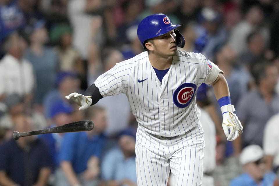 Chicago Cubs' Seiya Suzuki watches his two-run home run off San Francisco Giants relief pitcher Tyler Rogers during the seventh inning of a baseball game Tuesday, Sept. 5, 2023, in Chicago. (AP Photo/Charles Rex Arbogast)