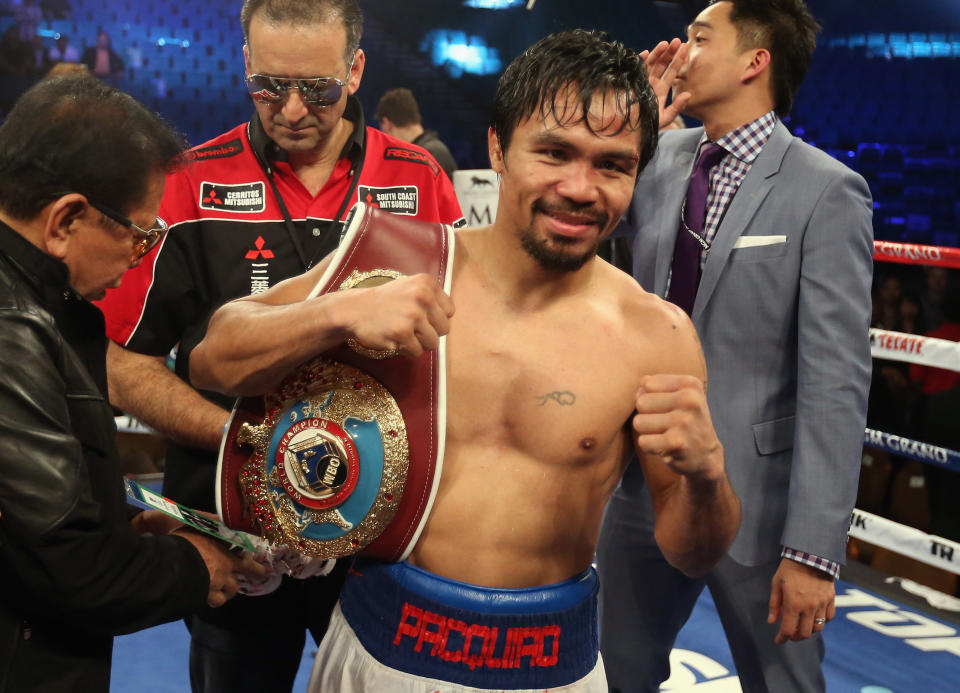 Manny Pacquiao will defend the WBO welterweight title against one-time kickboxer Chris Algieri on Nov. 22 in Macau, China.&nbsp; (AFP Photo/Jeff Gross)