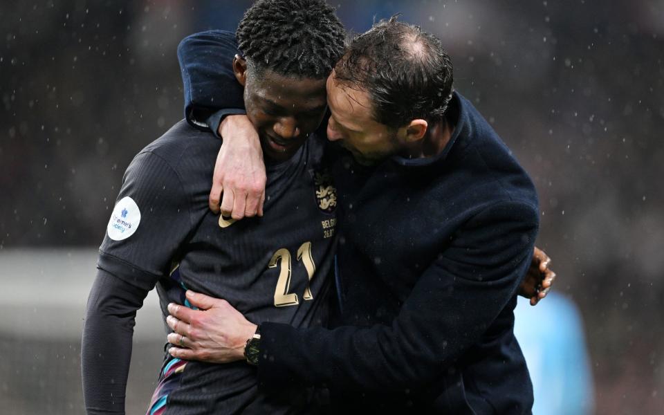 Gareth Southgate congratulates Kobbie Mainoo on a job well done