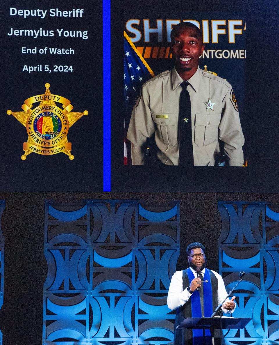 Pastor Lee B. Walker Jr. delivers the eulogy during the funeral of Montgomery County Sheriff's Deputy Jermyius Young.