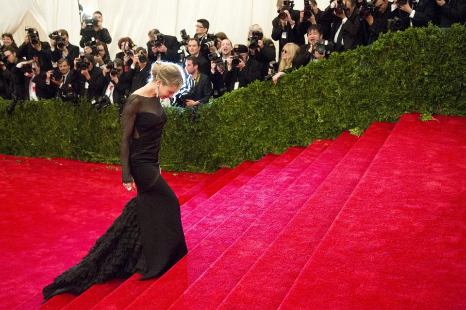 Renee Zellweger arrives at the Metropolitan Museum of Art Costume Institute gala benefit, celebrating Elsa Schiaparelli and Miuccia Prada, Monday, May 7, 2012 in New York. (AP Photo/Charles Sykes)