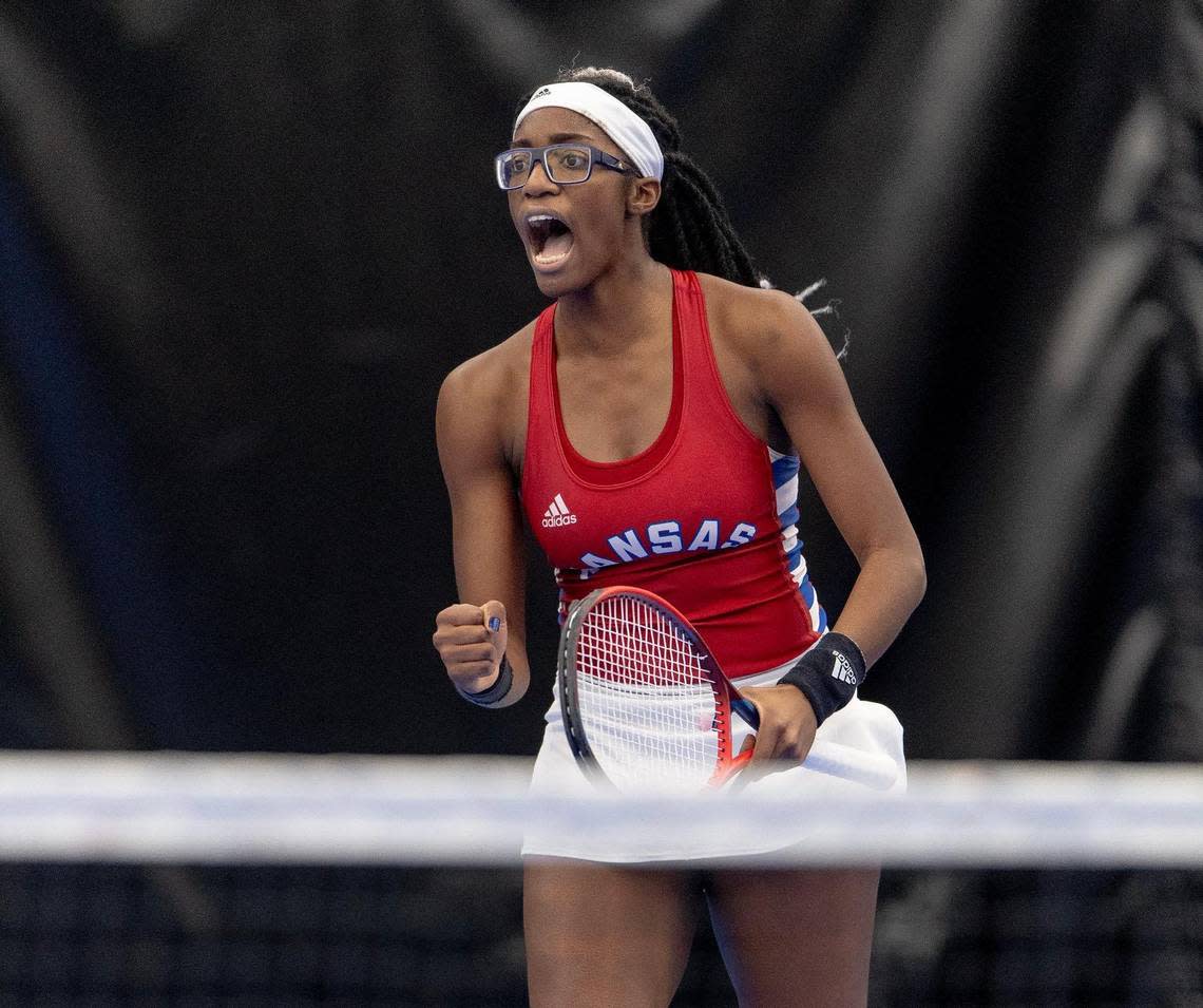 Malkia Ngounoue celebrates a point during a doubles match against St. Mary’s on Sunday, Feb. 26, 2023, in Lawrence, Kan.