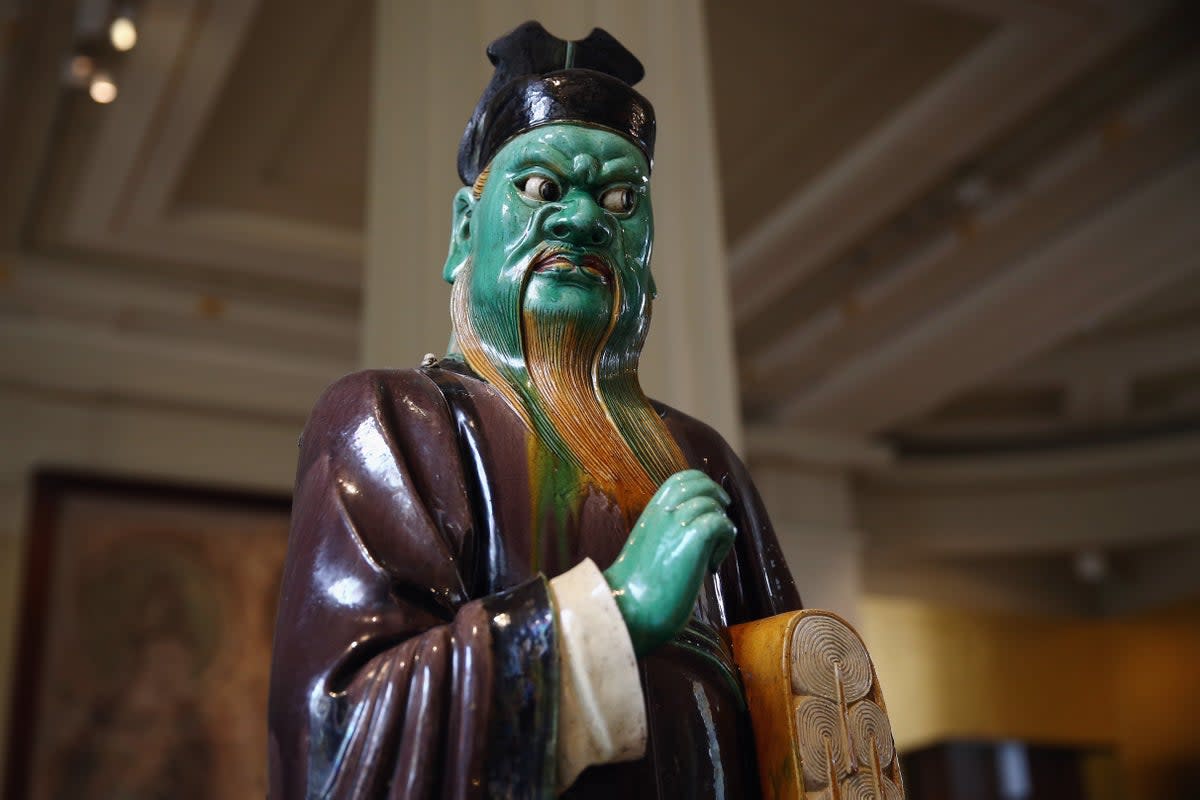 File: A Ming Dynasty 16th century stoneware figure is displayed during a press call at the British Museum  (Getty Images)