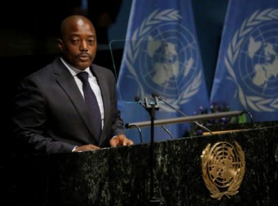 Congo President Joseph Kabila delivers his remarks during the opening ceremony of the Paris Agreement signing ceremony on climate change at the United Nations Headquarters in Manhattan, New York, U.S., April 22, 2016.   REUTERS/Carlo Allegri