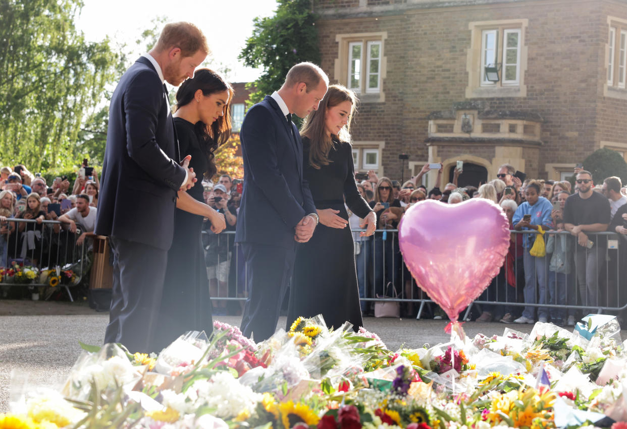 The Prince and Princess of Wales and the Duke and Duchess of Sussex viewing the messages and floral tributes left by members of the public at Windsor Castle in Berkshire following the death of Queen Elizabeth II on Thursday. Picture date: Saturday September 10, 2022.