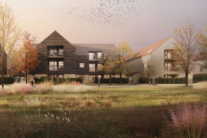 CGI showing three-storey blocks of flats with grass land and trees in the front.