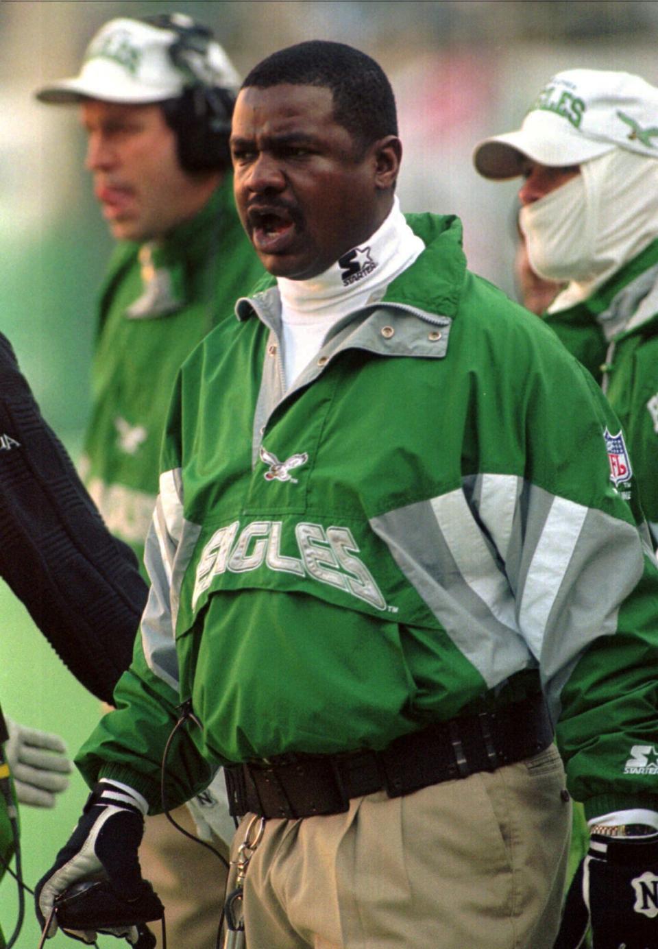 Eagles head coach Ray Rhodes encourages his team from the sidelines during the second quarter of their game against the Phoenix Cardinals Sunday, Dec. 17, 1995.  The Eagles defeated the Cardinals 21-20 earning a home berth in the playoffs.