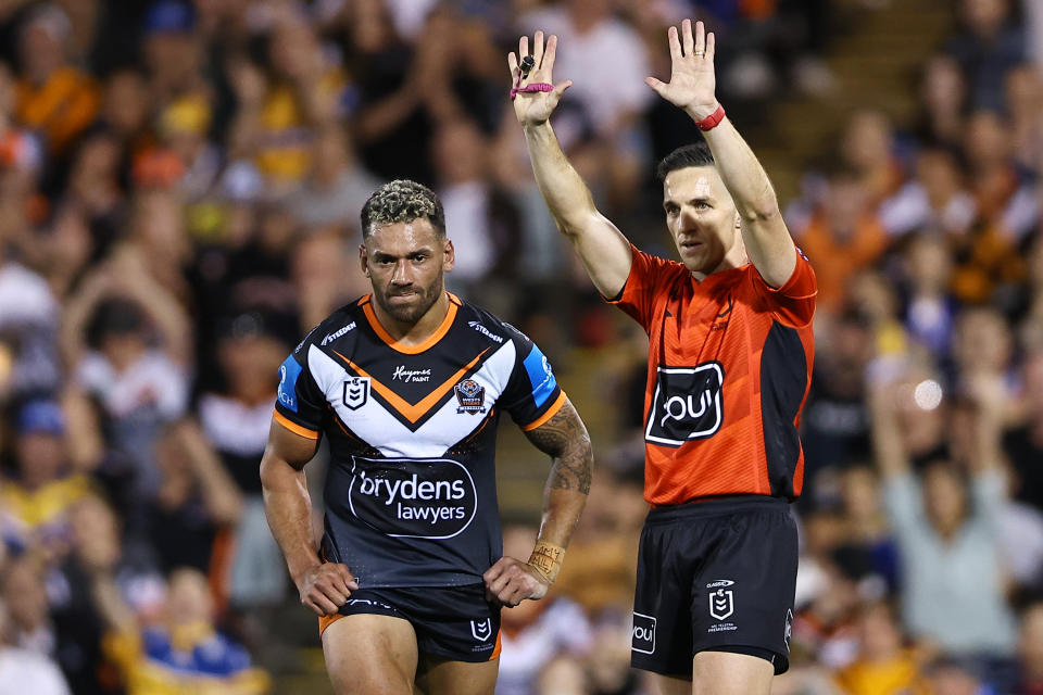 SYDNEY, AUSTRALIA - SEPTEMBER 06: Apisai Koroisau of the Tigers is sent to the sin bin by referee Peter Gough during the round 27 NRL match between Wests Tigers and Parramatta Eels at Campbelltown Stadium, on September 06, 2024, in Sydney, Australia. (Photo by Jeremy Ng/Getty Images)