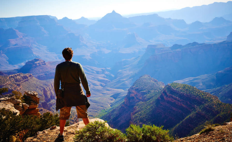 Traveler Looking out Over Mountains