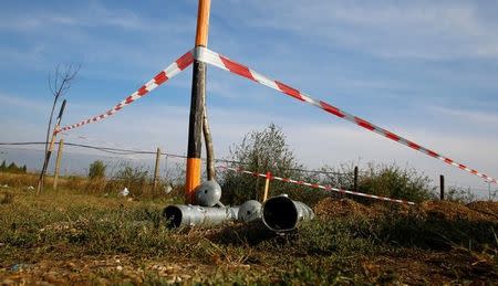 Ground anchors for a fence are seen at the Austrian-Hungarian border near Nickelsdorf, Austria, September 19, 2016. REUTERS/Leonhard Foeger