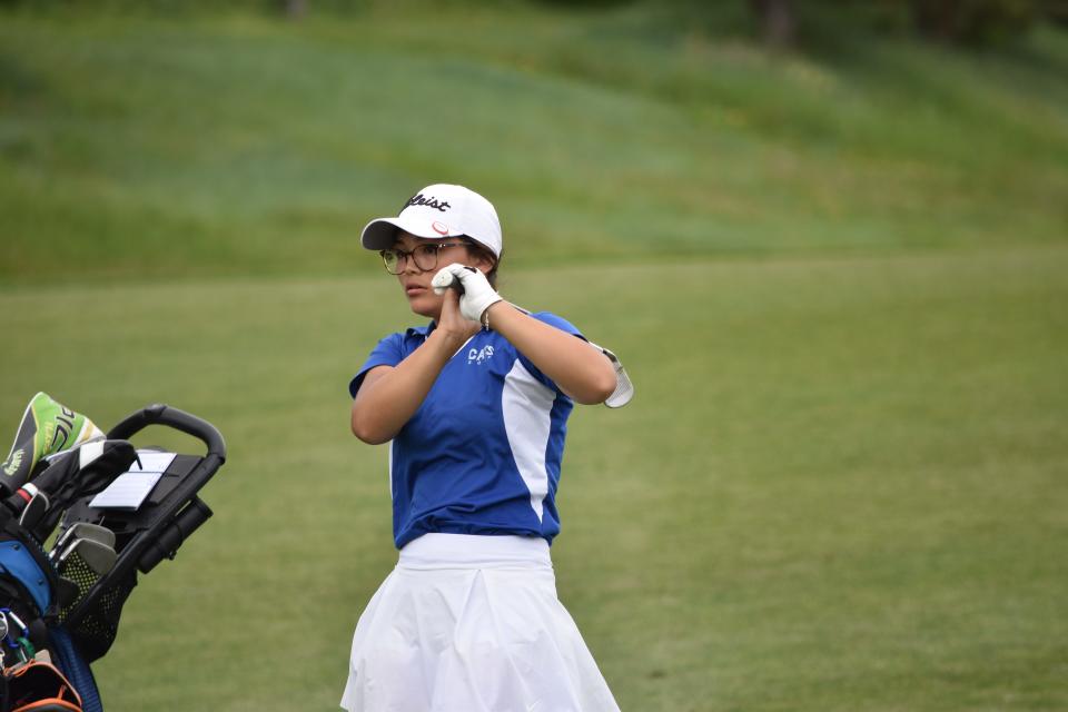 Sofia Contreras of Pueblo Central stares down a shot during the CHSAA Class 4A girls golf state championship at Thorncreek Golf Course in Thornton on May 31, 2023.