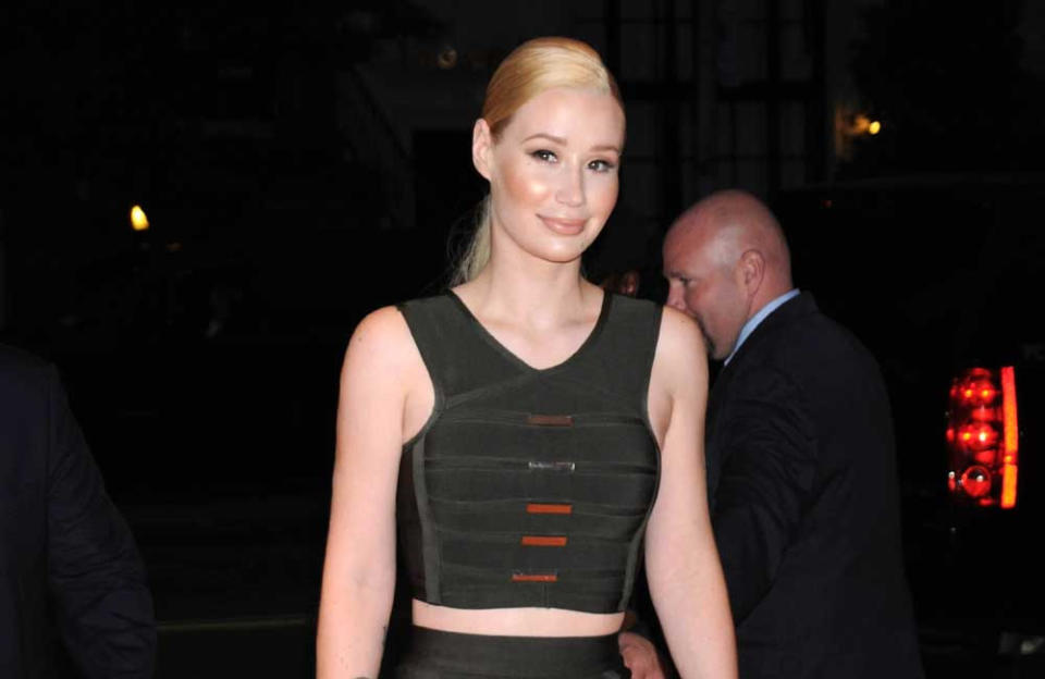 Iggy Azalea urged fans to get the COVID-19 vaccine credit:Bang Showbiz