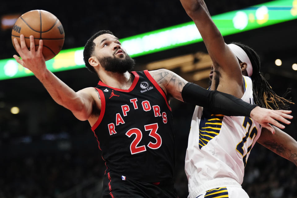 Toronto Raptors guard Fred VanVleet (23) shoots around Indiana Pacers forward Isaiah Jackson (22) during the first half of an NBA basketball game in Toronto, Wednesday, March 22, 2023. (Frank Gunn/The Canadian Press via AP)