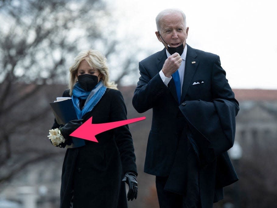 Joe Biden and Jill Biden exit Marine One. An arrow points to a corsage of white gardenias on Jill's wrist