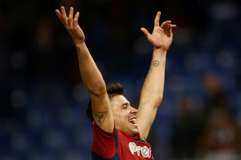 Genoa's forward Giovanni Simeone celebrates at the end the football match Genoa vs Juventus on November 27, 2016